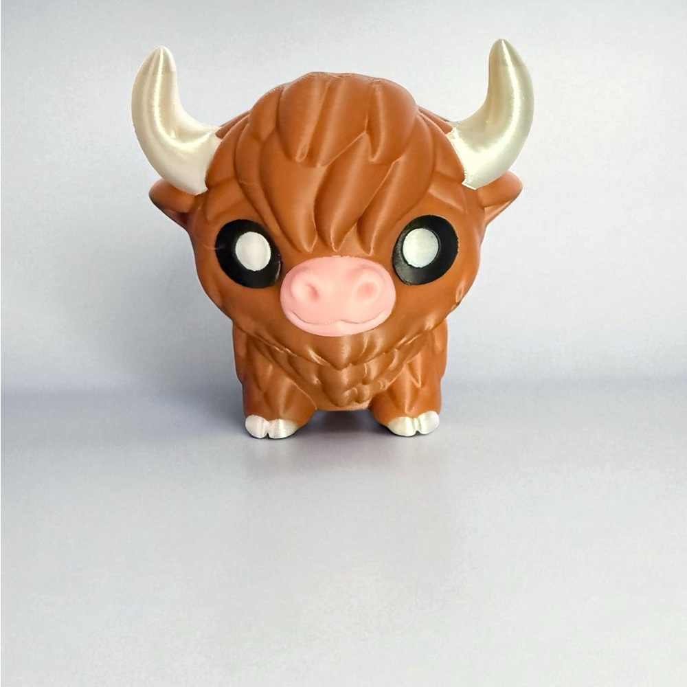 Charming Brown and Cream Buffalo Figurine